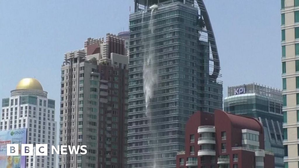 Earthquake turns Bangkok rooftop pool into waterfall